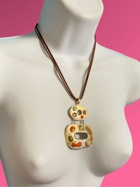 CHICO’S Gold Tone Pendant On Brown Leatherette Cording